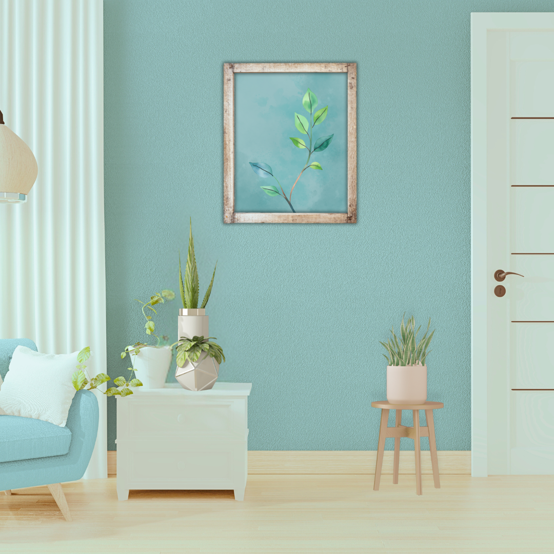 Framed teal botanical print displayed in a minimalist home area.