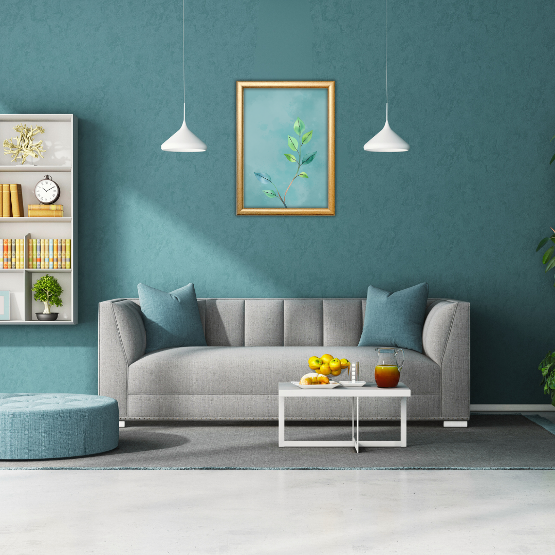 Single botanical wall print in moody green and teal hues in a cozy living room.