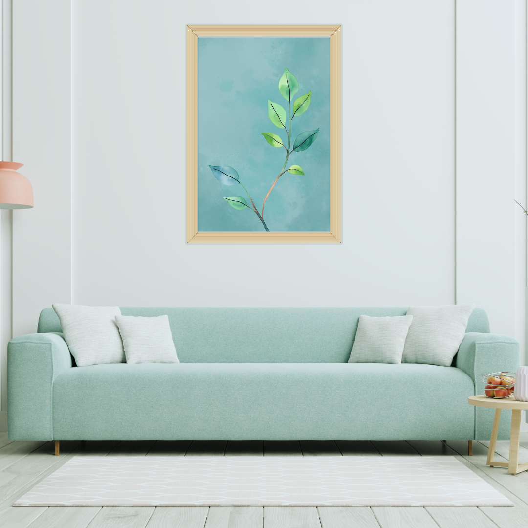 Watercolor botanical print of a green leaf stem on a smoky teal background featuring in a living room with mint green color decor.
