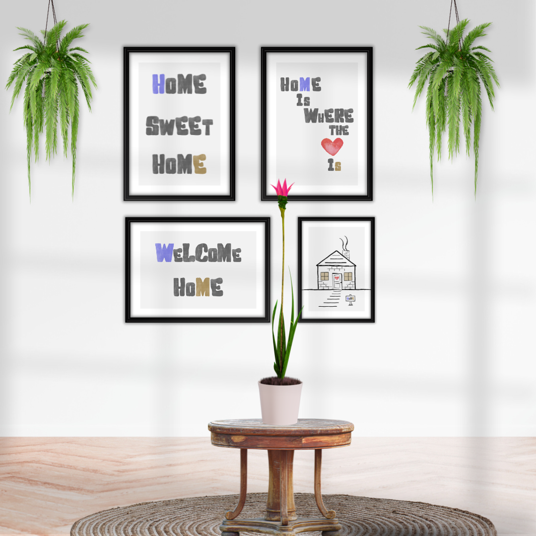 Framed prints with motivational phrases on a wall with plants and a center table.