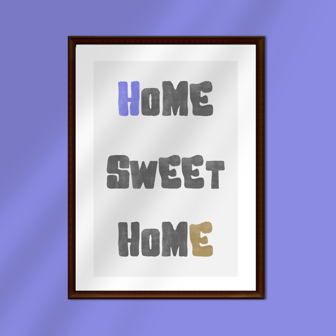 Framed poster with 'Home Sweet Home' text on a purple background