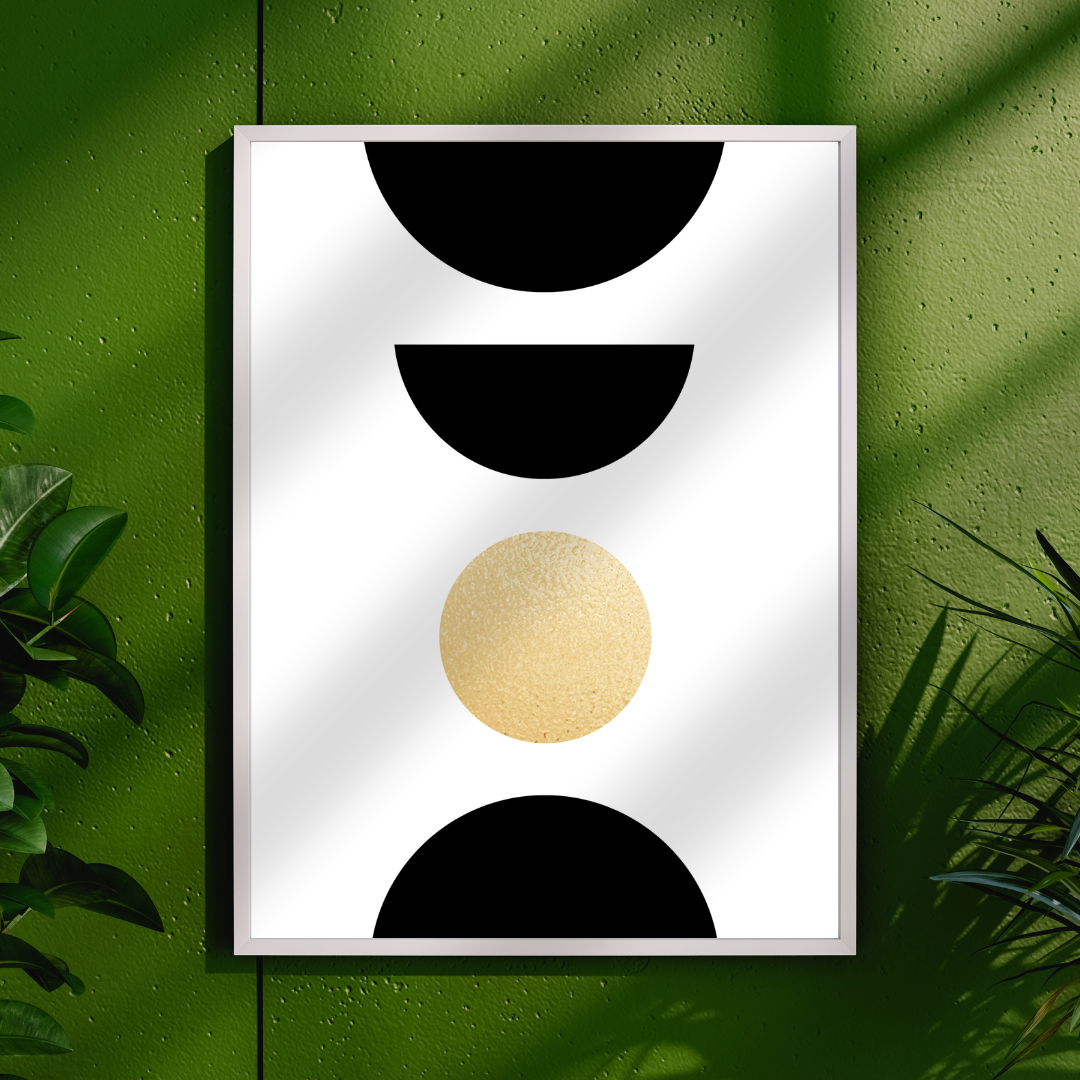 Framed boho art print with black and gold shapes on a green wall with plant decor.