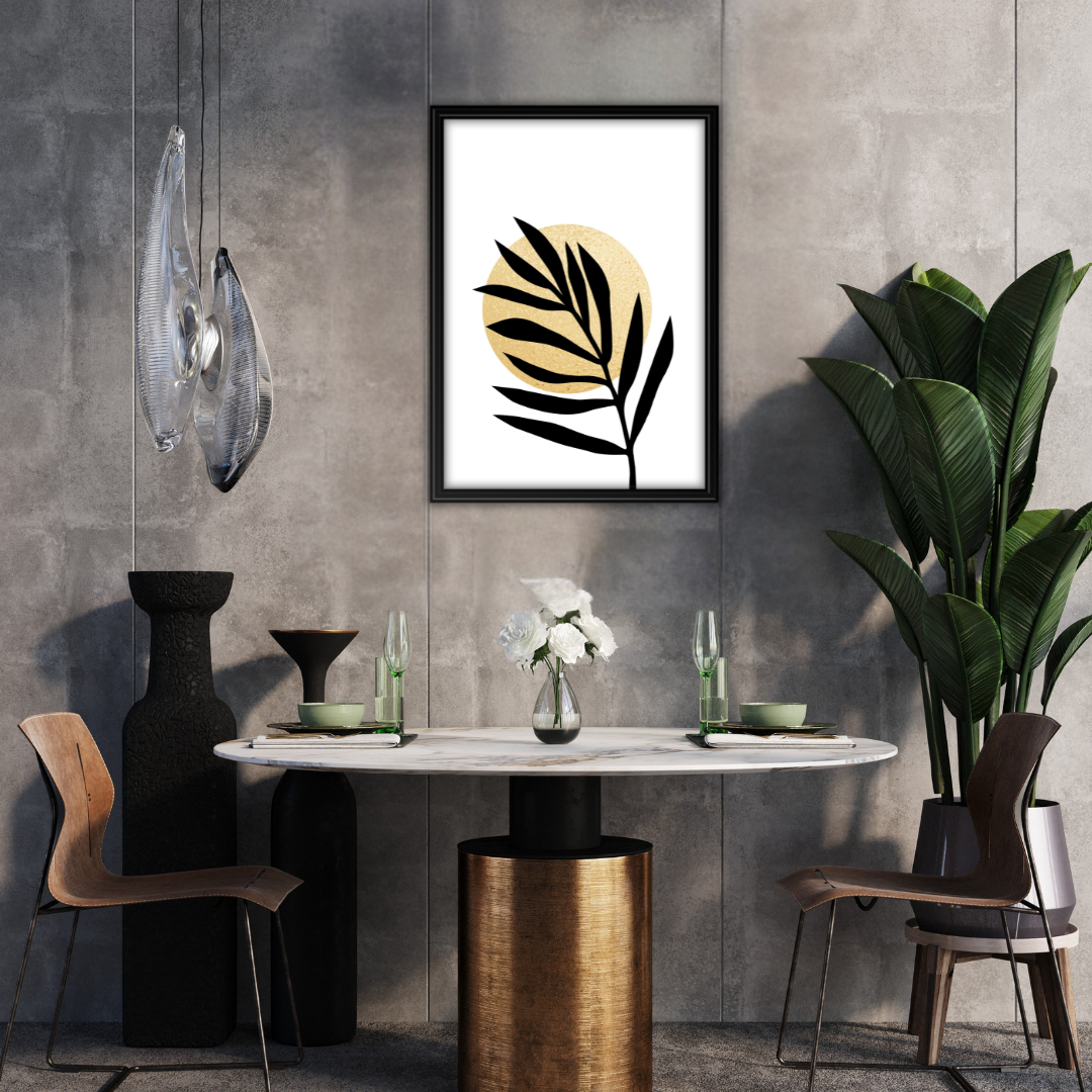 Modern interior with a dining table, chairs, and decorative elements against a gray wall with a framed black and gold boho style wall art.