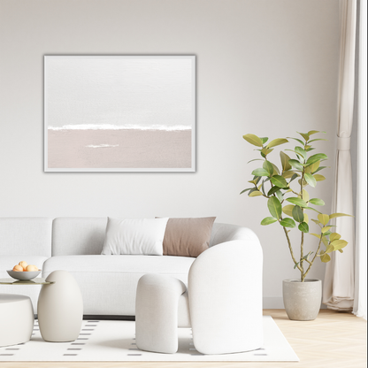 Modern living room with white sofa, ottoman, and plant against a soft wall featuring a minimalist landscape art piece.