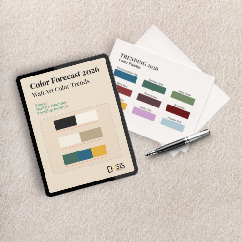Tablet with a 2026 color forecast guide and color swatch sheets on a carpet