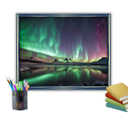Close‑up of Northern Lights landscape in a recycled metal frame with decor of books and a pen holder.