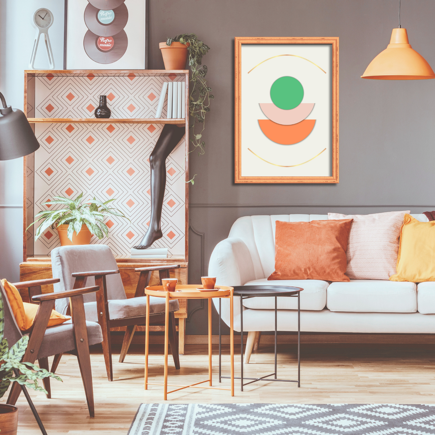 Boho geometric wall art with stacked semicircles in orange, pink and green with gold lines above a neutral sofa.
