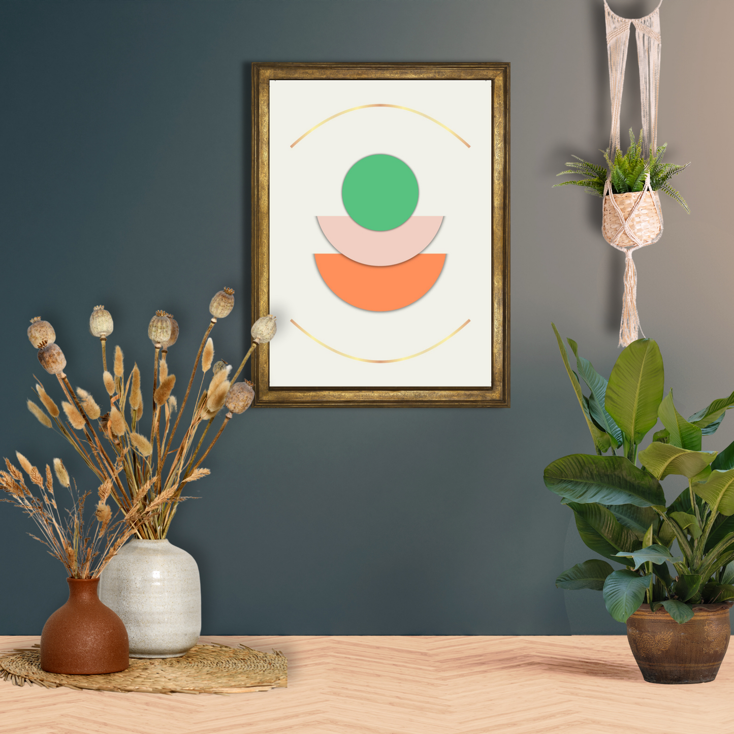 Printable boho balance artwork displayed on a shelf beside dried pampas grass décor.