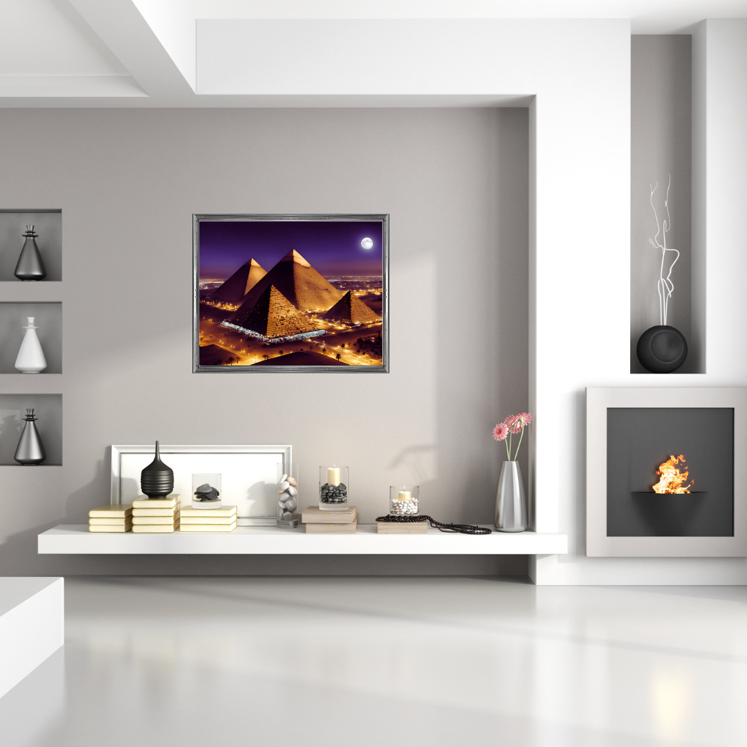 Framed moonlit Cairo pyramids print above a minimalist white mantel with black vases and candles on book stacks.