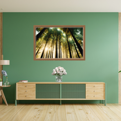 Close‑up of woodland path art in a natural wooden frame above a low wooden table in an olive-green setting.