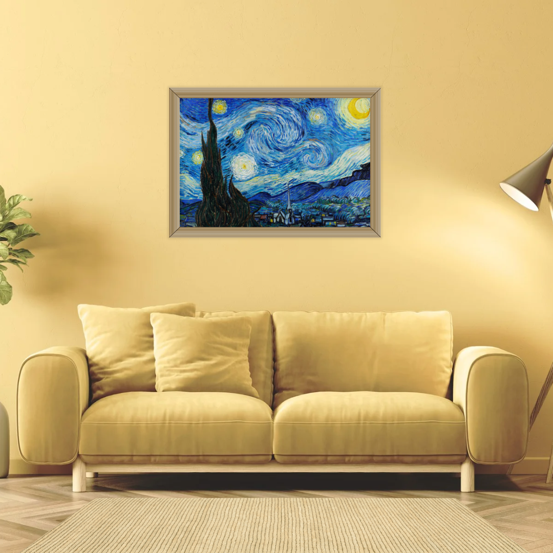 Framed Van Gogh Starry Night print above a yellow velvet sofa in a modern living room.