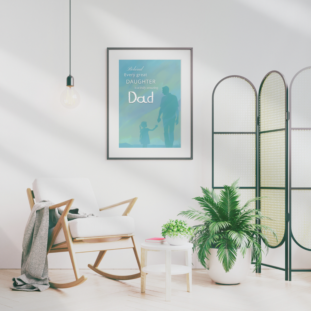 Framed dad quote artwork in reading space with a blanket on a rocking chair and side table in a neutral setting.