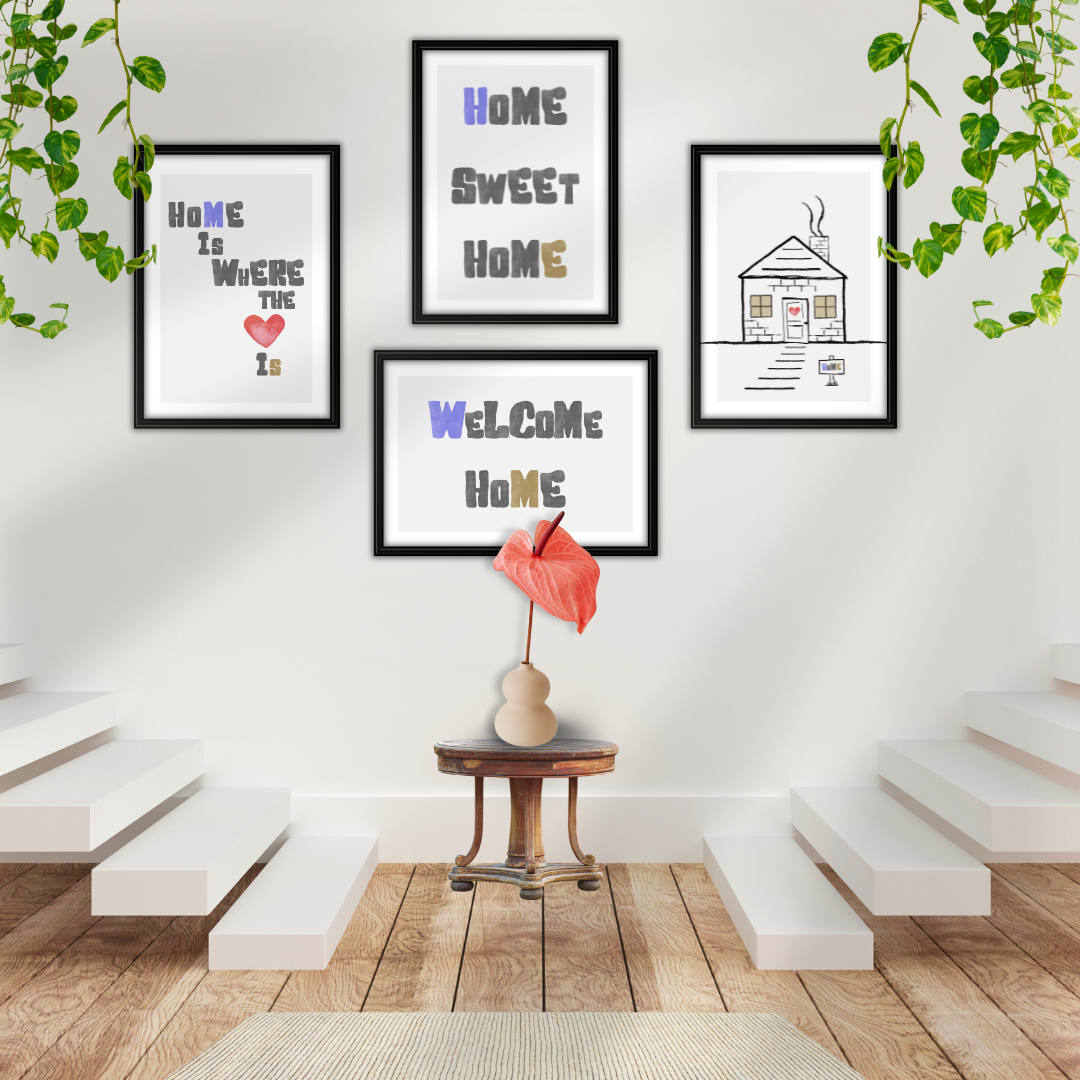 Four framed prints including 'Welcome Home' on a wall with decorative elements between a staircase.
