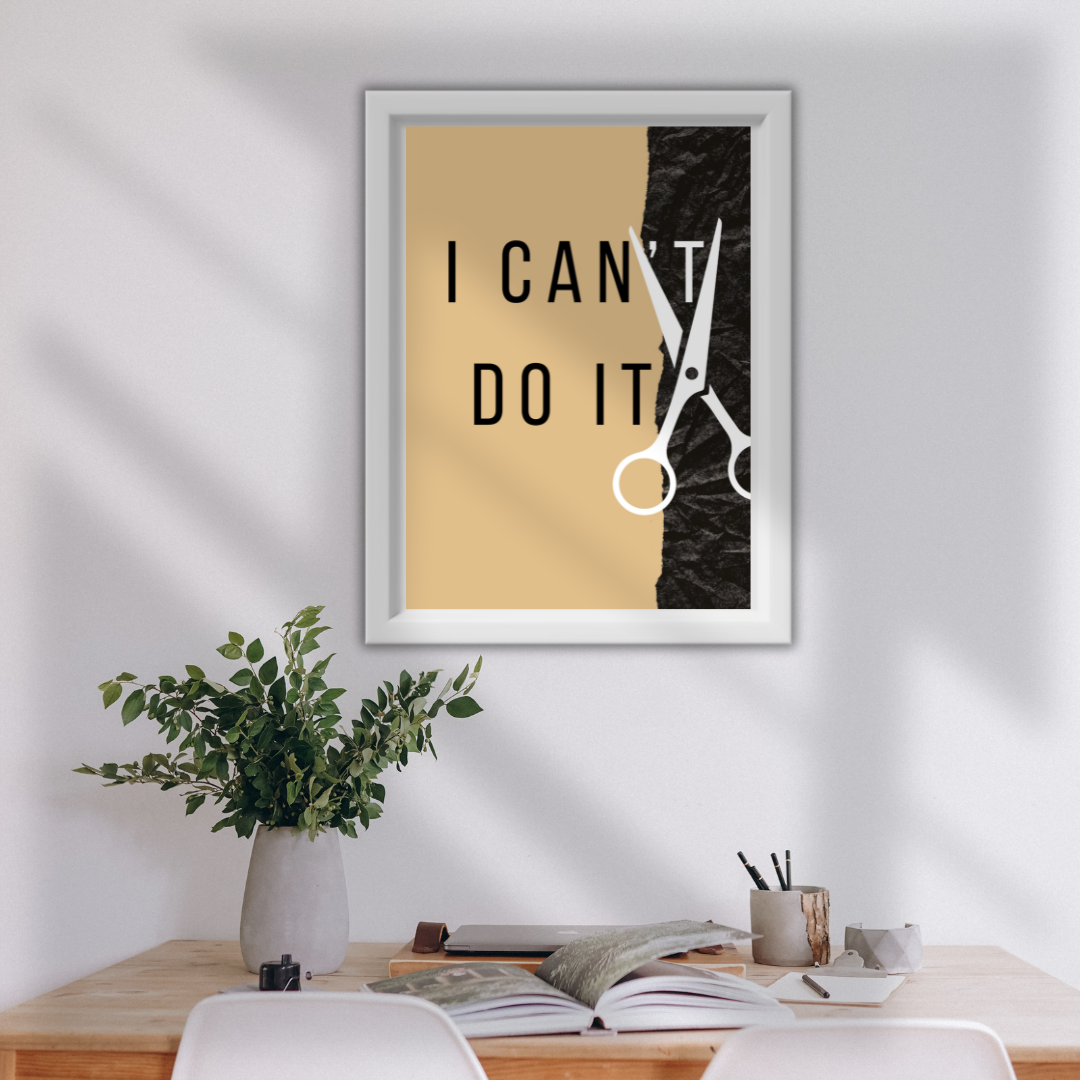 Minimalist home study featuring scissors‑cut quote print above some books, a pen holder and a potted plant.