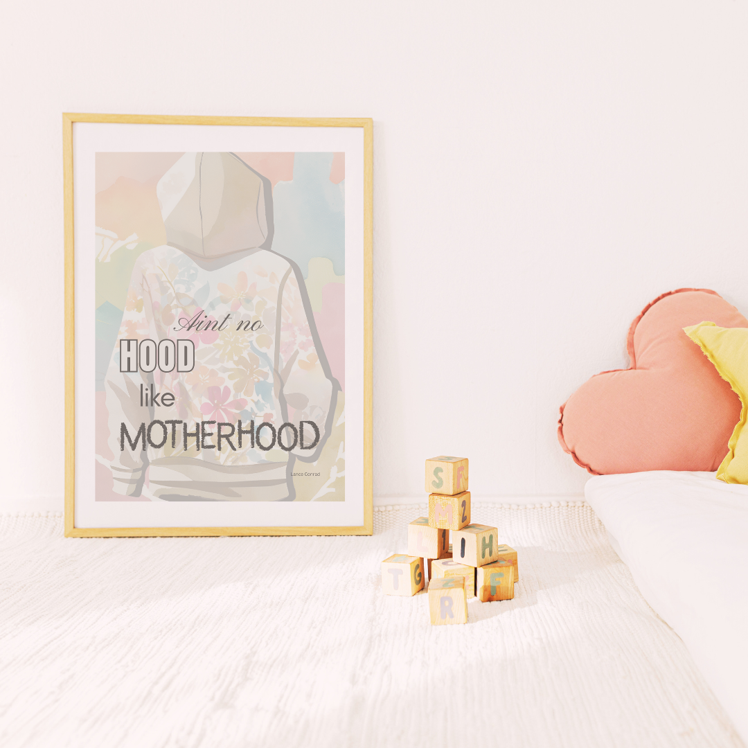 Kids’ playroom featuring framed motherhood quote leaning against a wall beside colorful pillows.