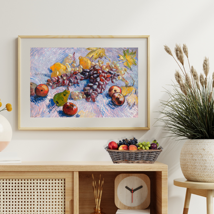 Framed Post‑Impressionist fruit painting adding warmth to a wood sideboard.
