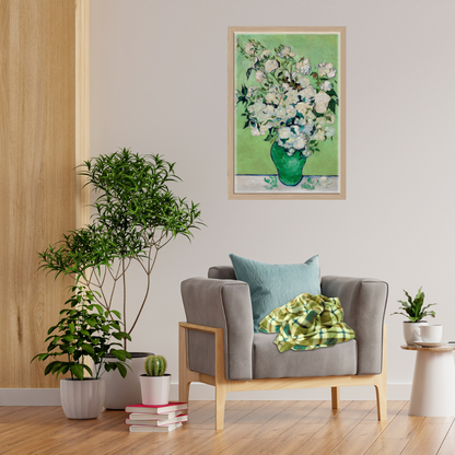 Cozy living area scene with Van Gogh Roses digital art above a comfortable earthy colored chair surrounded by plants and books.