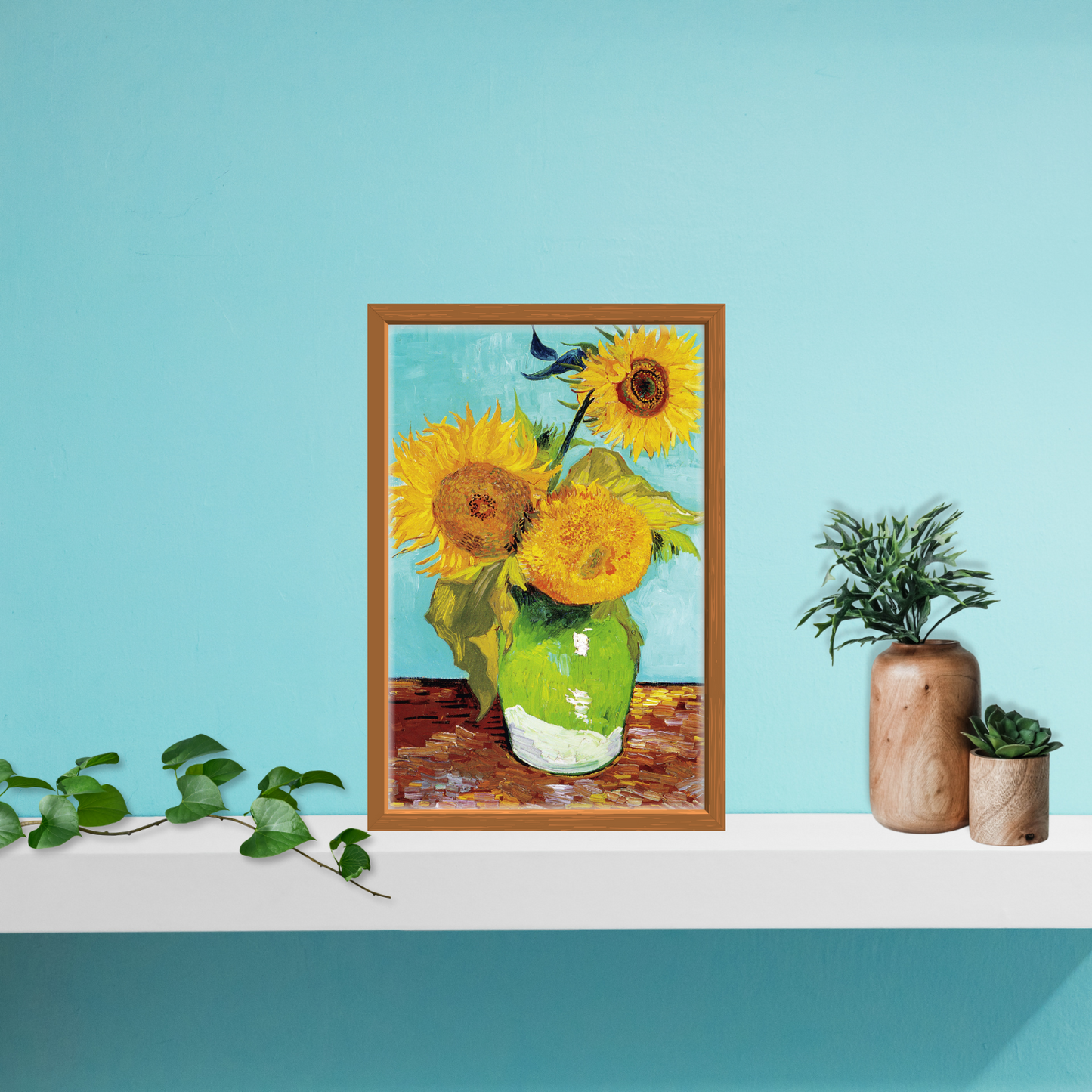 Close‑up of Sunflowers print in a natural wooden frame on a crisp white shelf with potted plant decor.