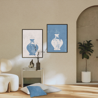 Modern interior with framed Wabi Sabi artwork on a wall, a plant, and a chair.