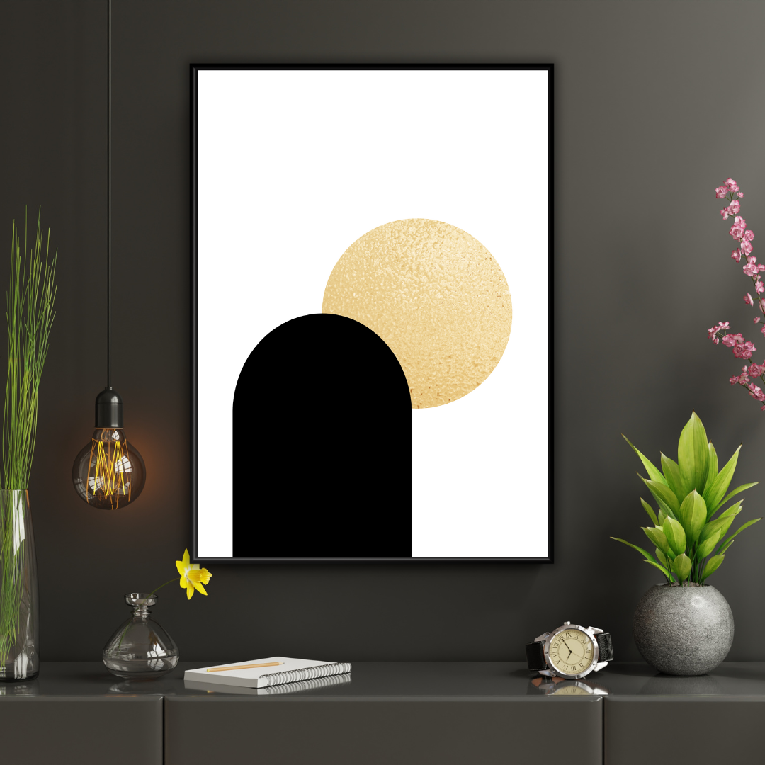 Framed boho style abstract art print with black arch and gold circles on a dark wall with decorative items.