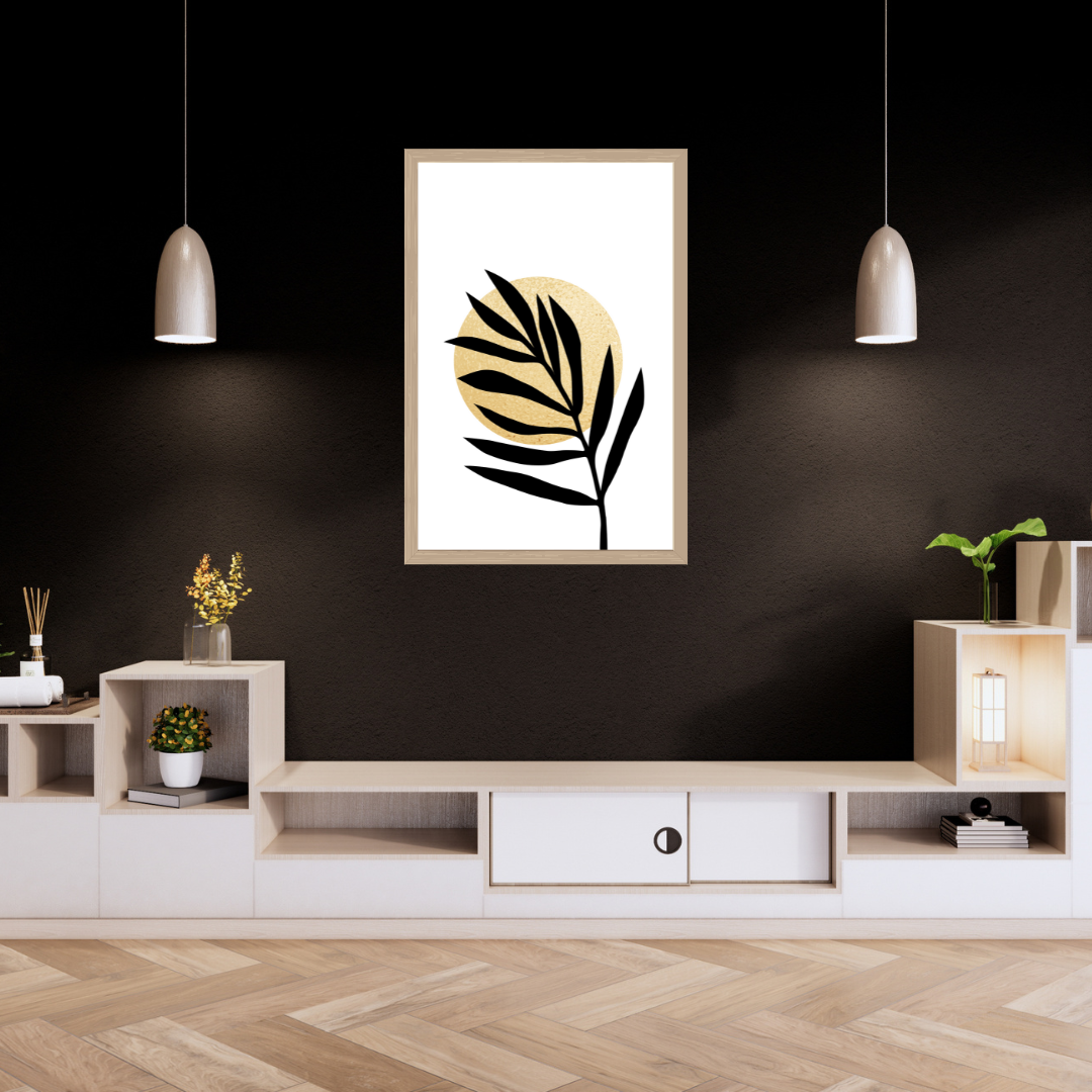 Framed boho style artwork of a leaf on a dark wall above a wooden entertainment unit.