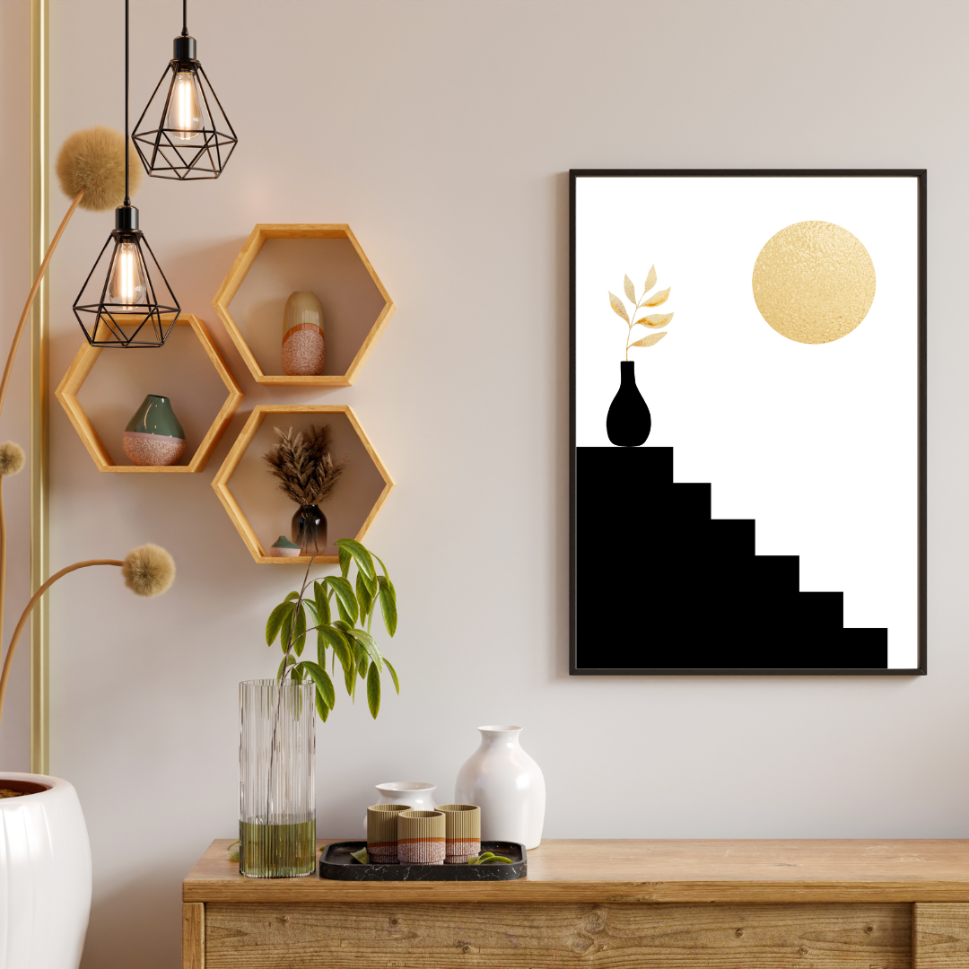 Modern interior with hexagonal shelves, decorative plants, and a framed boho black and gold artwork mounted on a neutral wall above a wooden console.