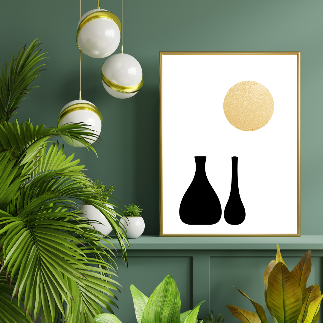 Modern interior design with a framed artwork of two black vases and a golden sun resting on a green shelf and a green backdrop.