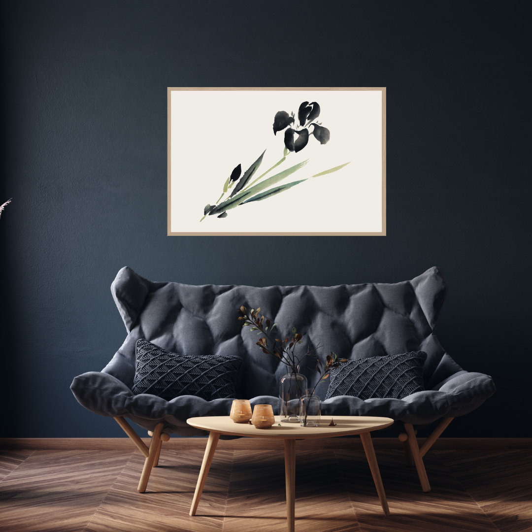 Framed Ukiyo-e iris botanical artwork above a dark gray sofa in a living room.