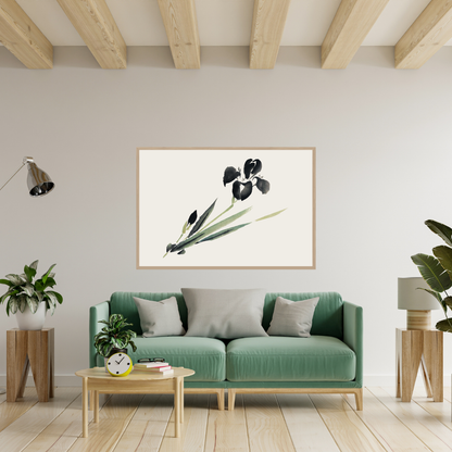 Modern living room with a green sofa, coffee table, and decorative plant with a vintage Japanese botanical ink art of an iris on the wall.