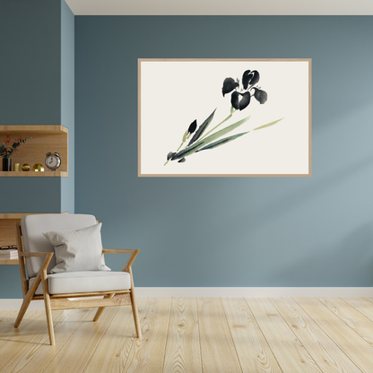 Framed vintage Ukiyo-e ink artwork of a black iris on a teal wall in a reading nook with a wooden chair and shelf.