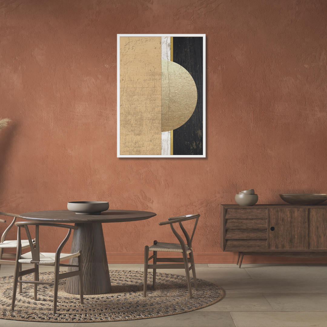Dining room with a wooden round table, chairs, and an abstract art piece mounted on a terracotta wall.