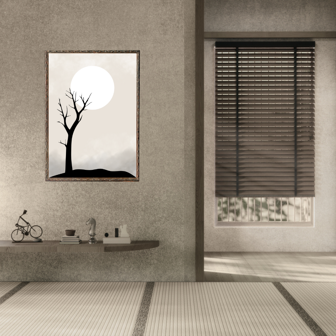 Framed Japandi artwork of a tree and white moon on a wall in a modern room with a neutral setting.