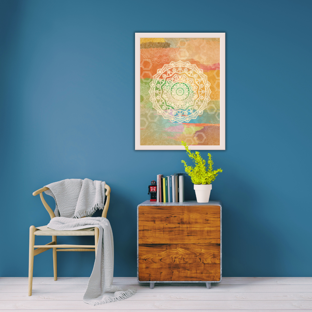 Reading room interior with a chair, wooden cabinet with books, and a colorful abstract wall art against a deep blue wall.