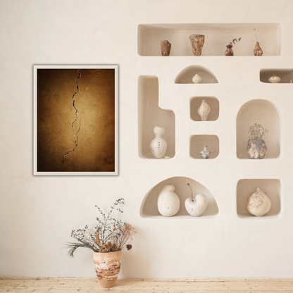 Wall with Japandi decorative shelves and a framed Kintsugi earth-toned artwork in a room.