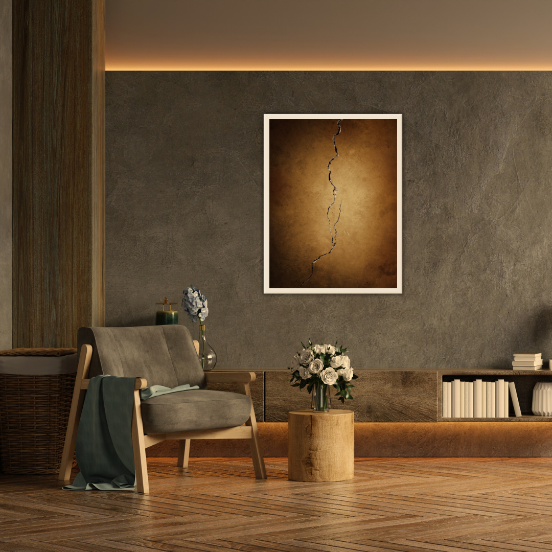 Modern living room with a chair, table, and decorative items featuring a Wabi Sabi artwork against a textured wall.