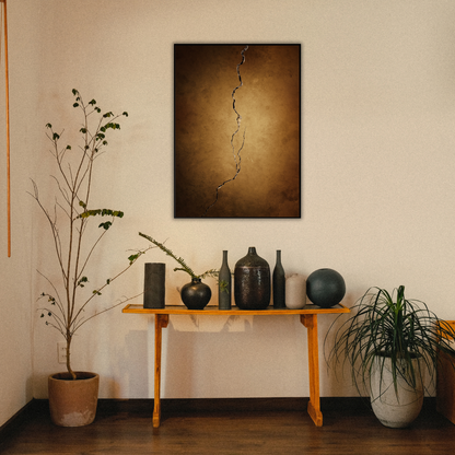Decorative setup with a table holding Japandi vases, plants, and a Wabi Sabi wall art piece above.