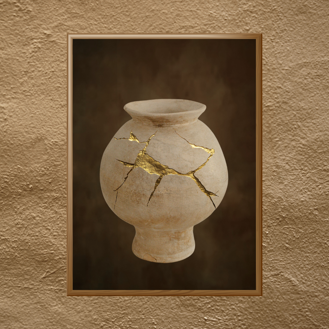 Framed Wabi Sabi artwork of a cracked vase with gold repair against a deep brown background mounted on a textured rustic wall.