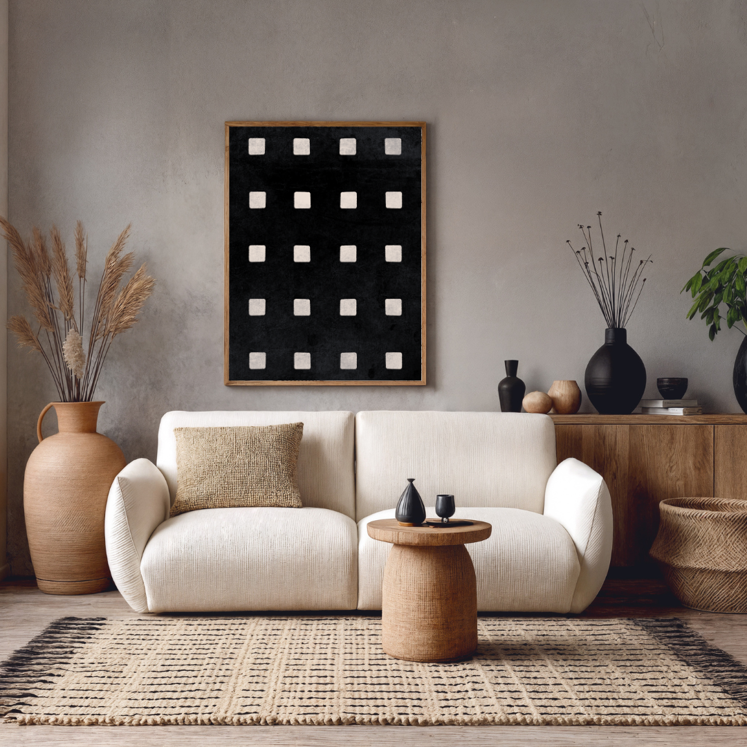 Modern Japandi living room with a white sofa, decorative pillows, and an abstract art piece featuring harmony squares on the wall.