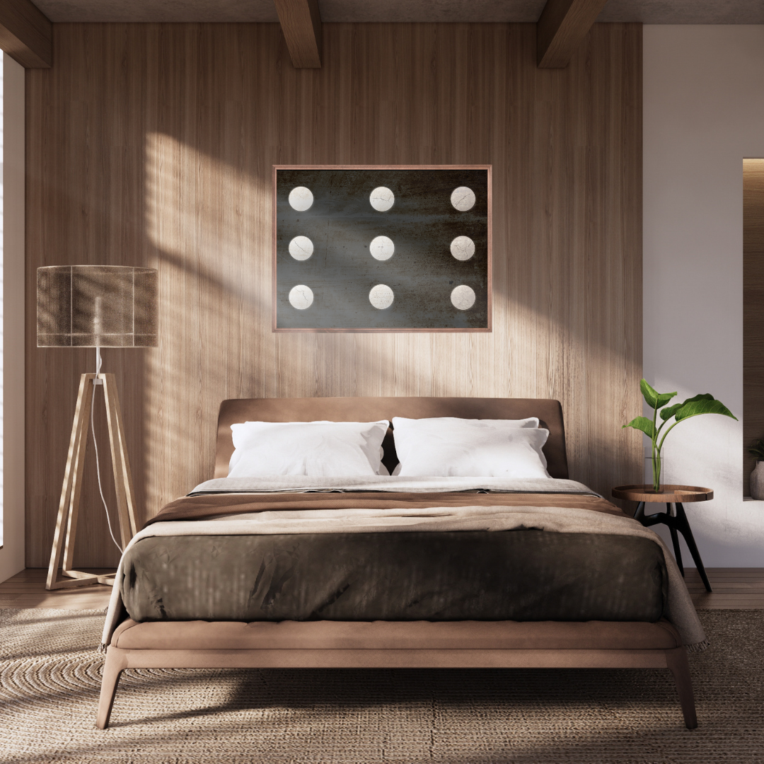 Modern minimalist bedroom with wooden bed and lamp featuring an abstract wall art framed against a wooden backdrop.