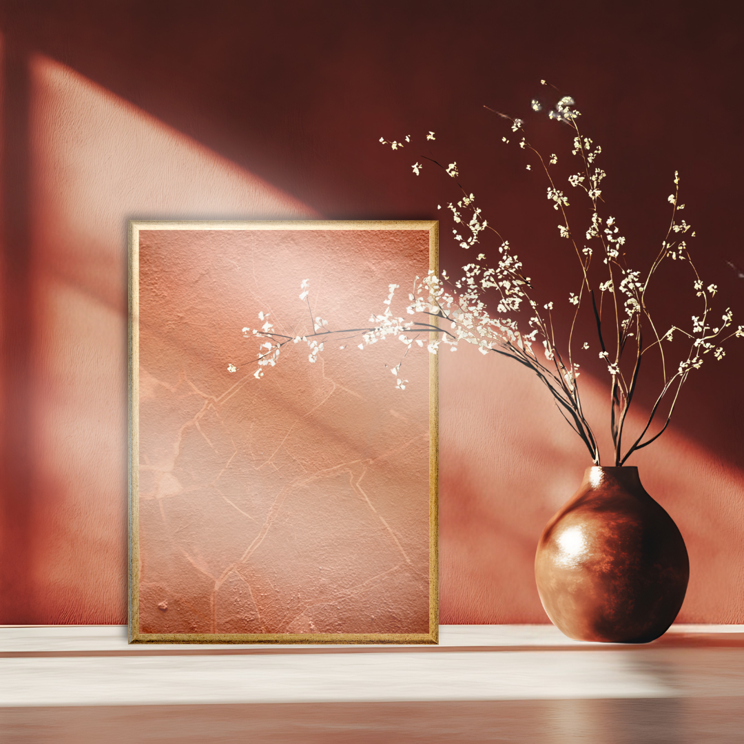 Terracotta Wabi Sabi wall art against a textured wall next to a Japandi vase with cherry blossom branches.