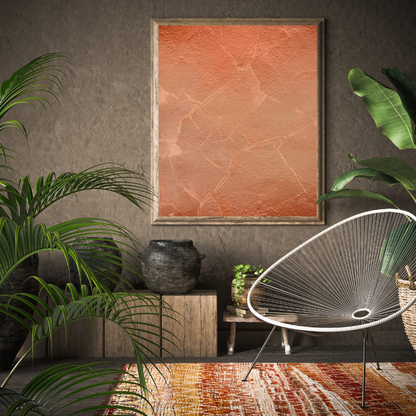 Modern Japandi earthy living room with a textured wall, plants, and a wire chair featuring a Wabi Sabi abstract art piece.