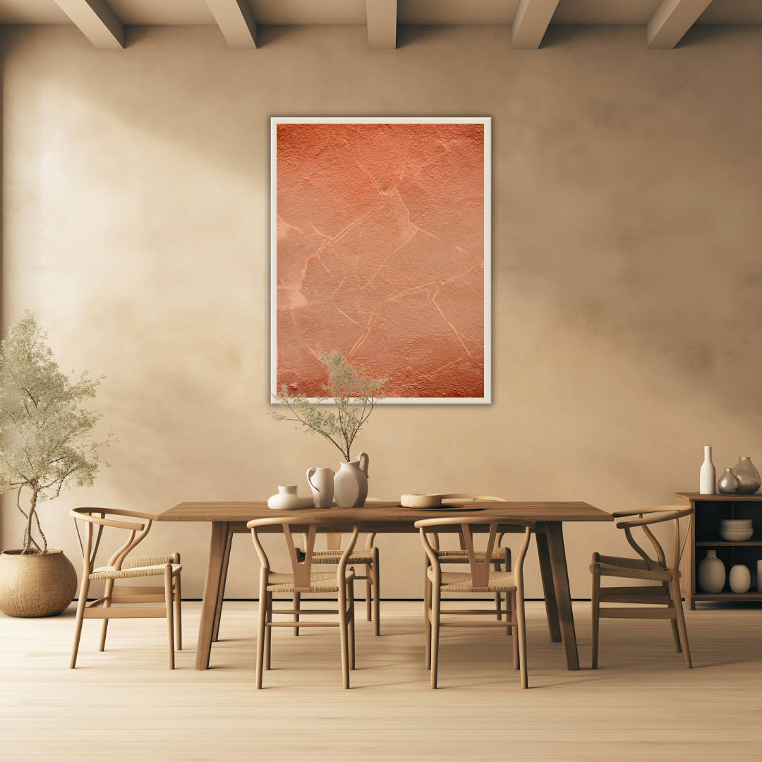 Earth toned Japandi style dining room with wooden table and chairs, framed Wabi Sabi artwork on the wall, and decorative items.